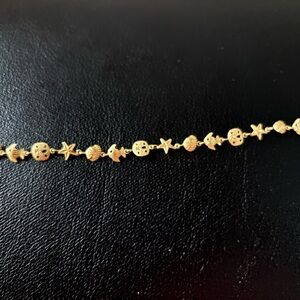 Gold Star and Shell Charm Bracelet